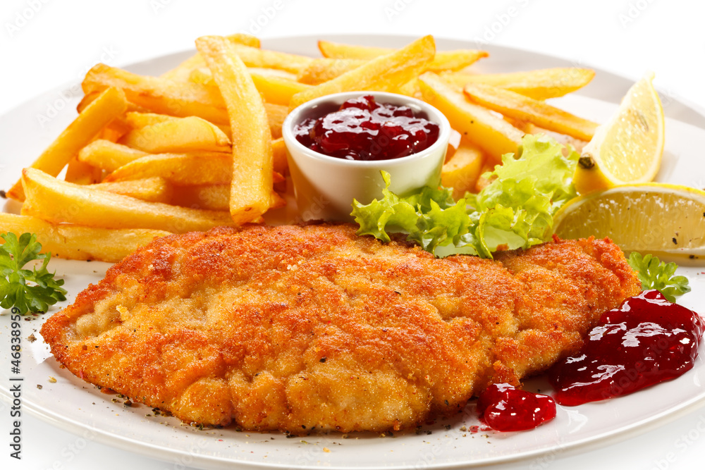 Pork chop, French fries and lingonberry Pork chop, French fries and lingonberry