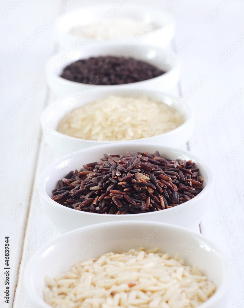 Different kind of raw rice, raw rice in the white bowls Different kind of raw rice, raw rice in the white bowls