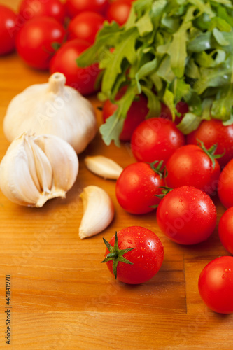 Tomatoes, garlic and arugula