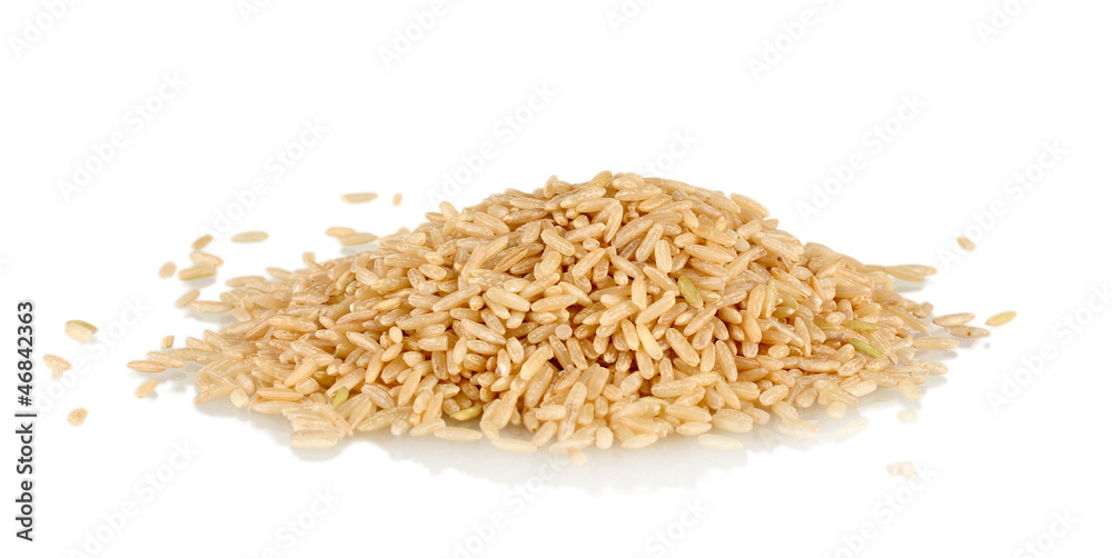 brown rice uncooked in a heap isolated on a white background brown rice uncooked in a heap isolated on a white background