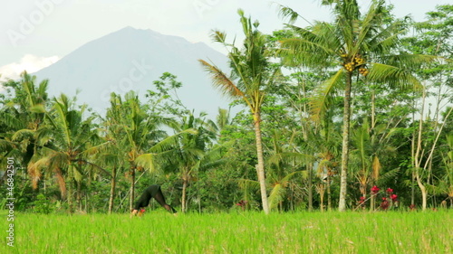 Wallpaper Mural caucasian woman meditating yoga in balinese temple Torontodigital.ca