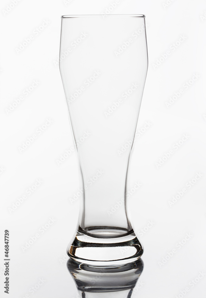 Empty crystal beer glass on a white background Empty crystal beer glass on a white background