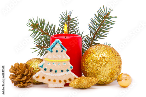 Christmas decorations and advent candle on white background.