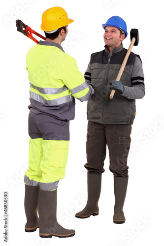 Tradesmen forming a partnership © auremar