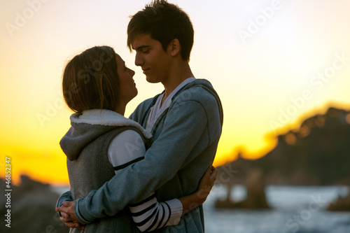 Fotografija Silhouette of romantic couple at sunset.