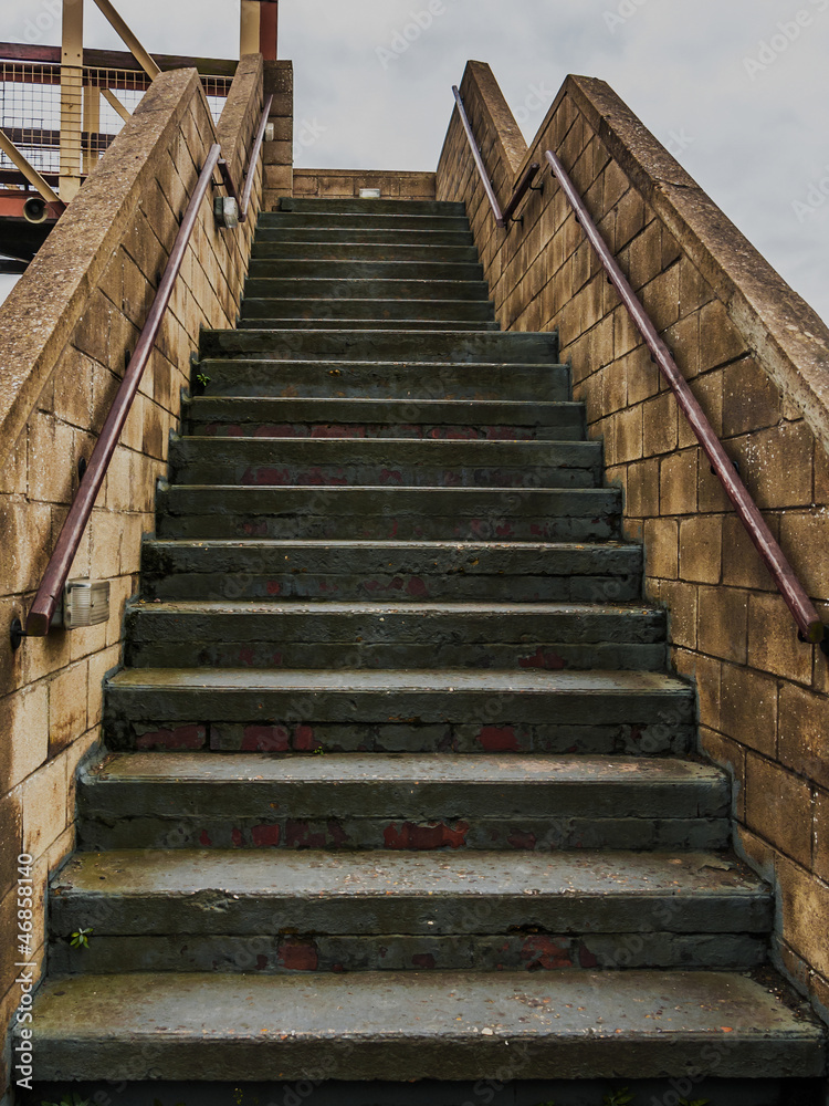 Concrete steps over a railway bridge Concrete steps over a railway bridge