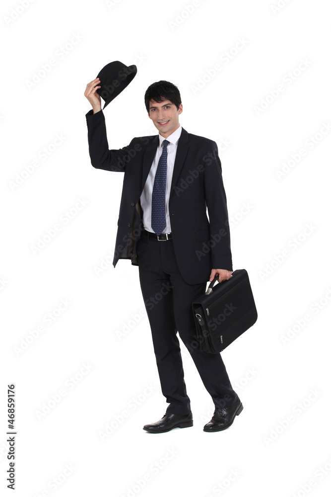 Businessman tipping his bowler hat Businessman tipping his bowler hat