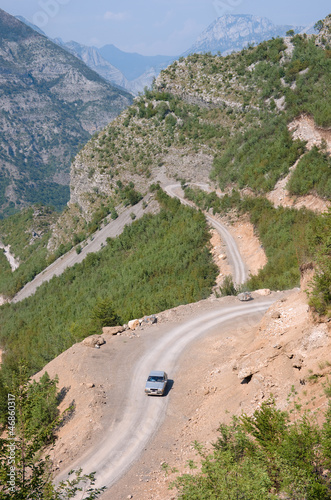 Car, Winding Road And Albanian Mountains photo