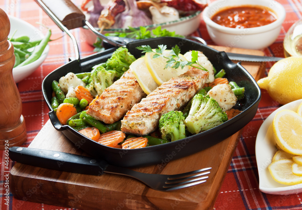 Grilled salmon steak and vegetables Grilled salmon steak and vegetables