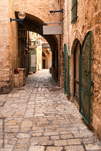 Fototapeta Naklejka Na Ścianę i Meble -  A narrow street in historic Jaffa , Israel