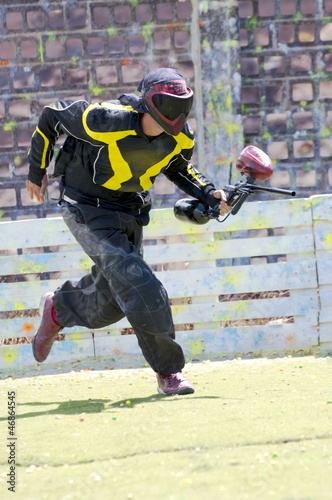 Paintball player in action