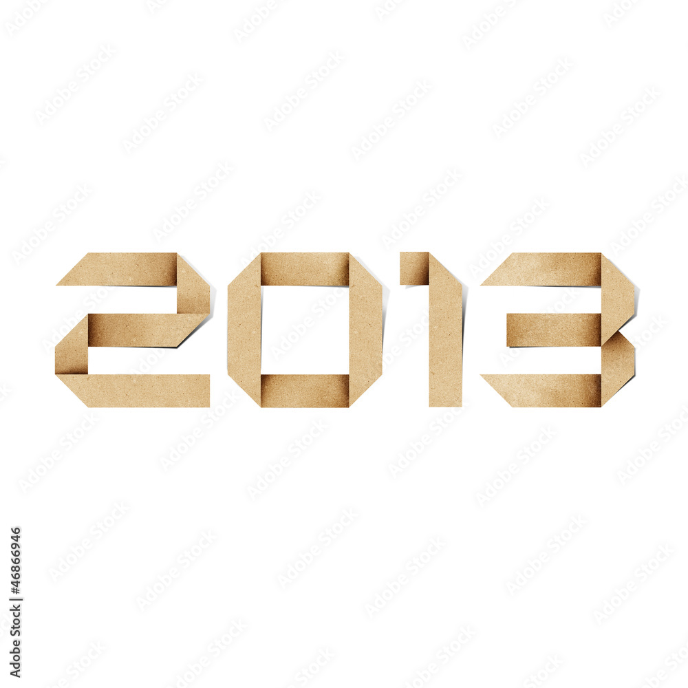 Obraz premium Happy new year 2013 recycled papercraft background.