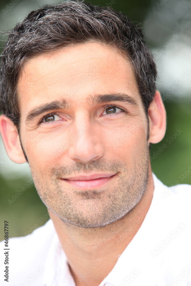 Fototapeta premium Close-up of dark haired man