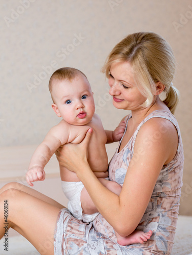 mother holding baby boy