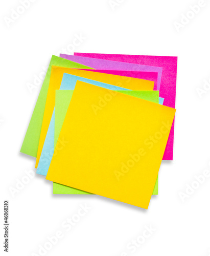 Heap of colorful sticky notes isolated on white background.