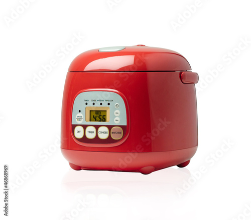 Electric rice cooking pot on white