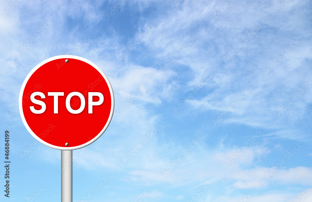 Obraz premium stop sign with blue sky