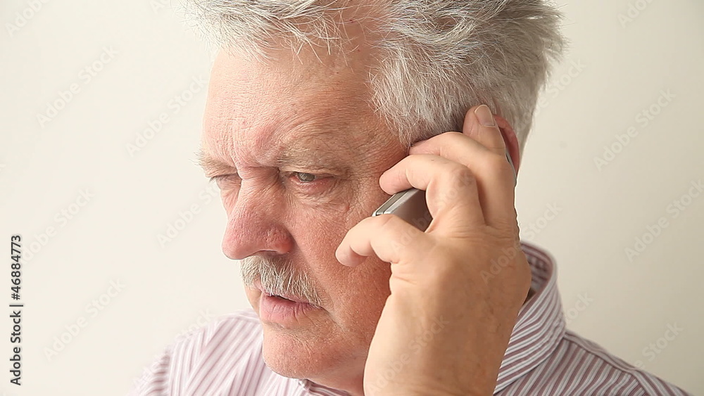 angry senior man on mobile phone angry senior man on mobile phone
