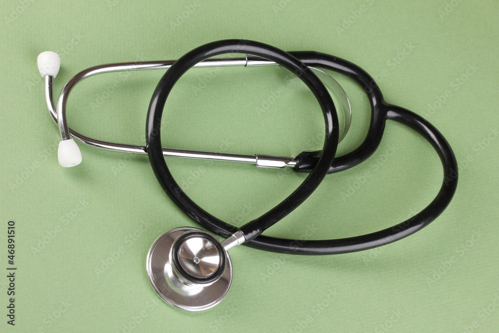 Stethoscope on green background Stethoscope on green background