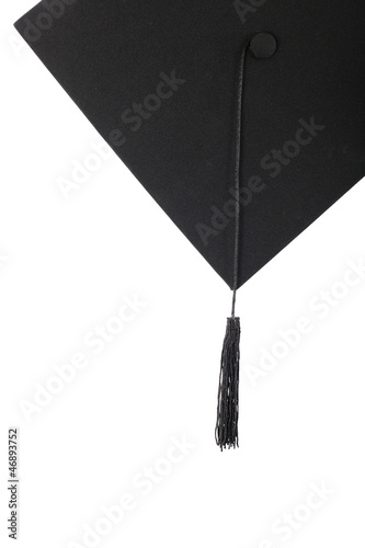 Graduation cap with black tassel on the white isolated