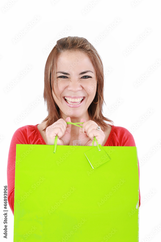 Young woman with shopping bags over white background Young woman with shopping bags over white background
