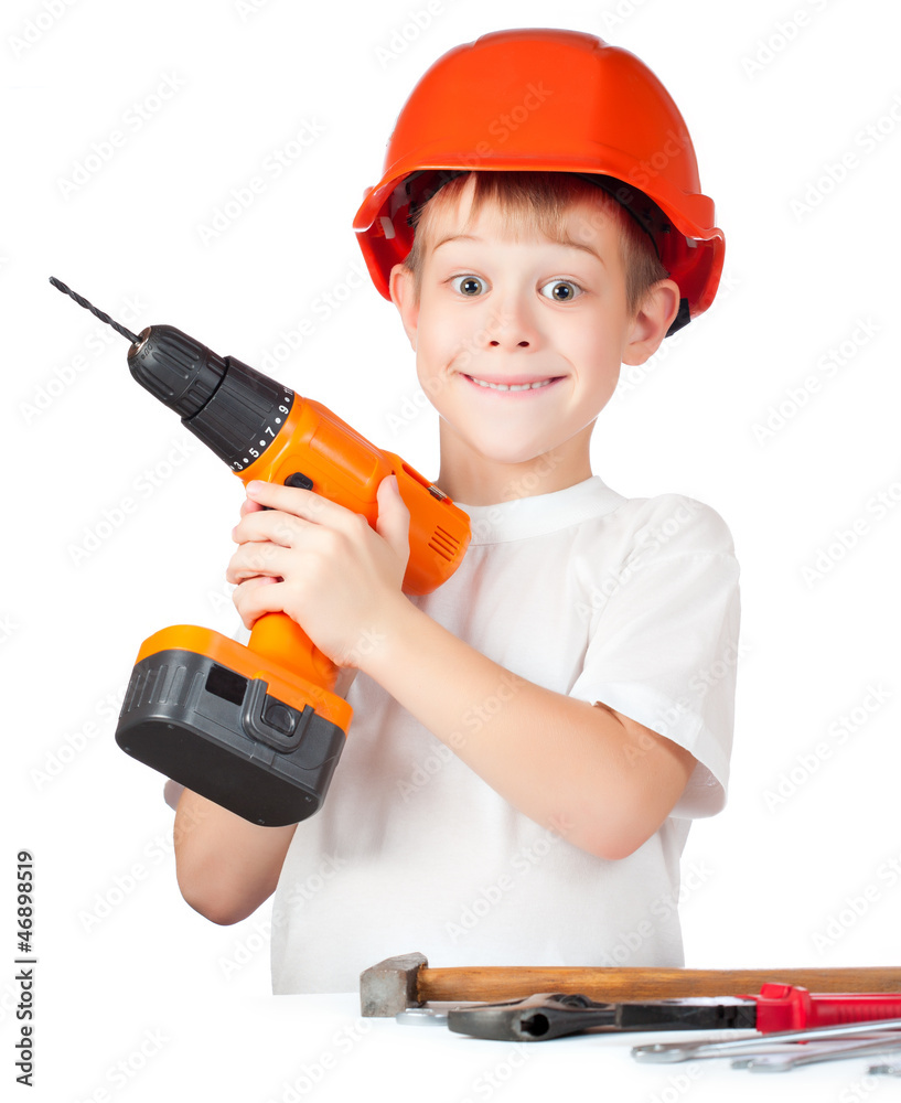 cheerful little boy with electric screwdriver cheerful little boy with electric screwdriver