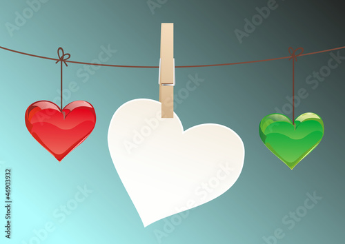 piece of paper in the form of heart hanging on a rope