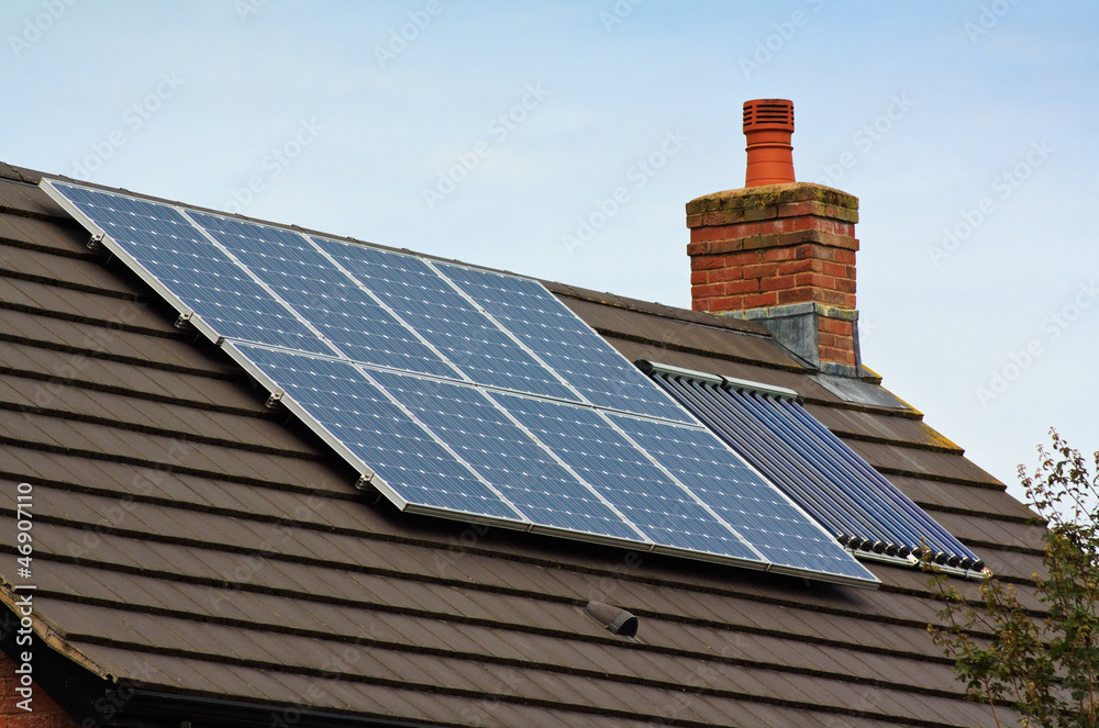 Fototapeta premium Central heating Solar Panels on a tiled roof