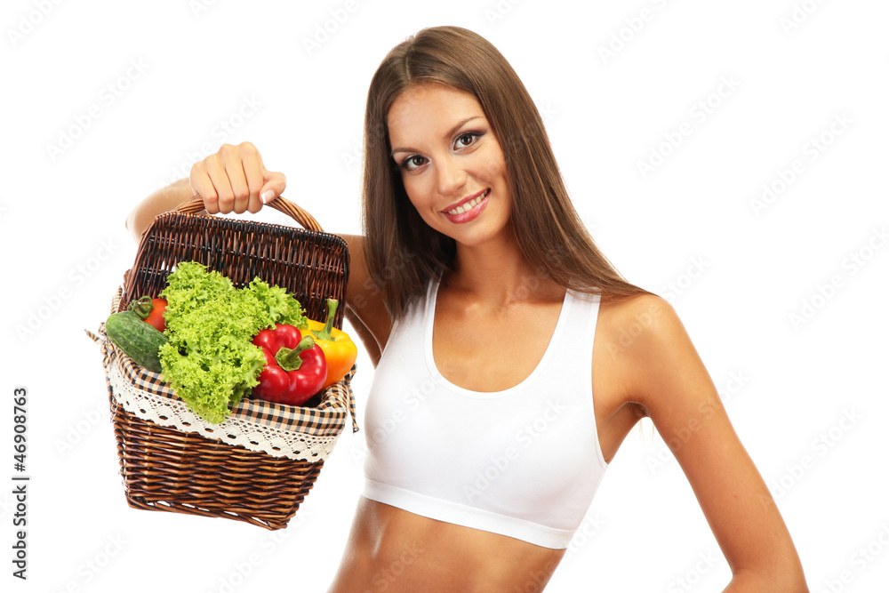beautiful young woman with vegetables in basket, isolated beautiful young woman with vegetables in basket, isolated