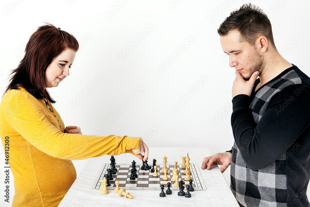 Man and woman playing chess Man and woman playing chess