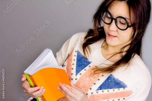 asian girl with a book