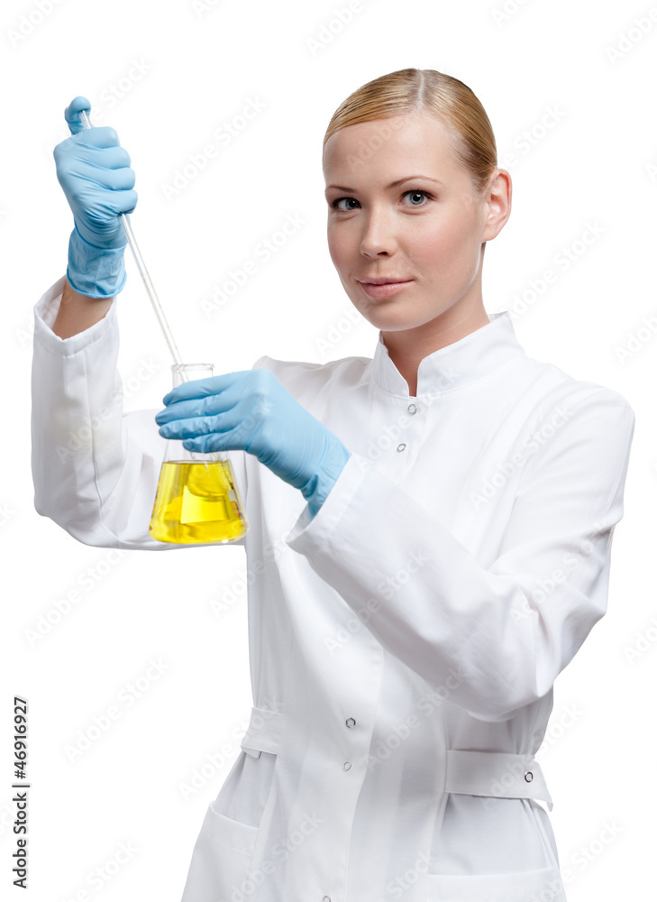 Chemist adds something to the liquid in the flask Chemist adds something to the liquid in the flask