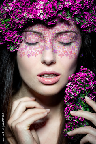 Close up portrait of model with flowered wreath