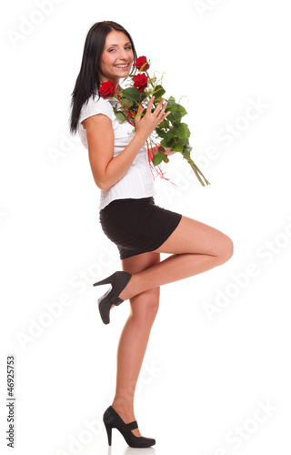 Beautiful young girl posing with a red rose woman isolated