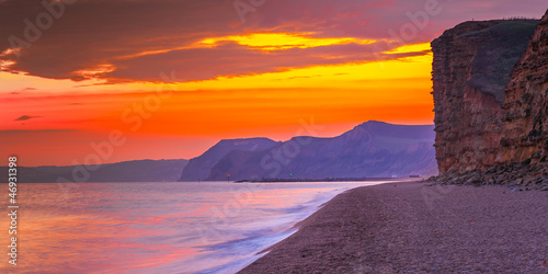 sunset over freshwater beach photo