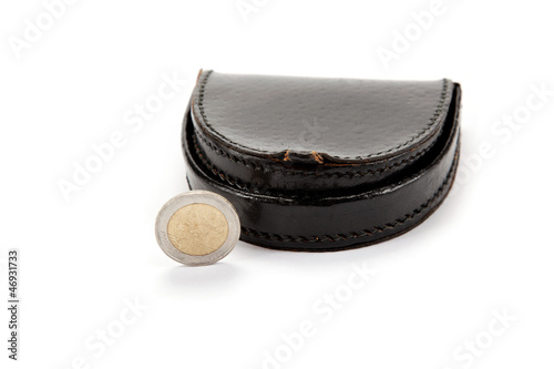 Black wallet and one euro coin isolated on white background.