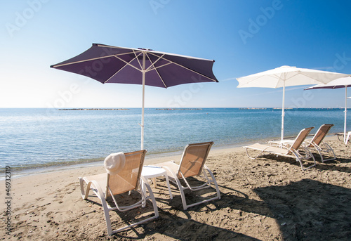 Beach chairs and umbrellas