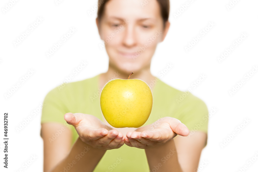 Apple floating above hands. Apple floating above hands.