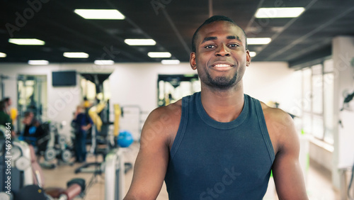Young black man portrait in the gym.