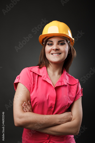Young engineer lady with hardhat
