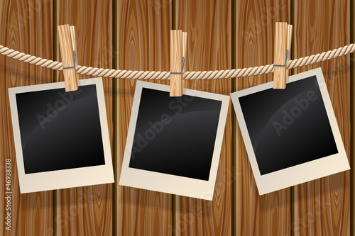 Photos hanging on a clothesline