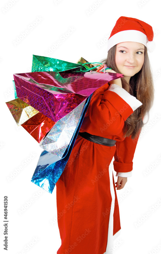 cute girl dressed as Santa brings gifts