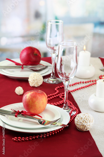 beautiful holiday table setting with apples, close up