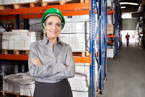 Female Supervisor Wearing Protective Eyeglasses At Warehouse