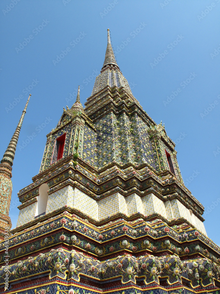 traditional Thai pagoda with colorful glass clay tiles