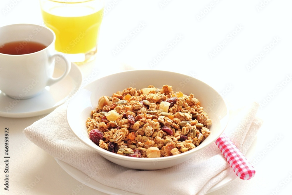 Dried fruits , nuts and seed granola for healthy breakfast Dried fruits , nuts and seed granola for healthy breakfast