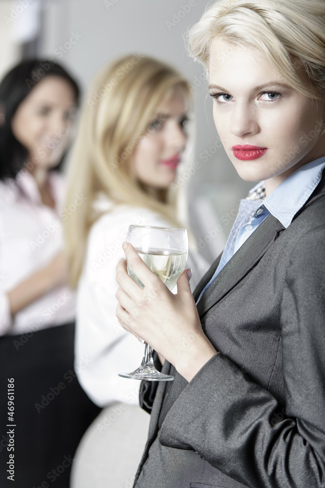 Women enjoying a glass of wine Women enjoying a glass of wine