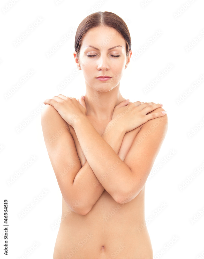 Woman Covering Up Her Breast With One Hand, Isolated In White