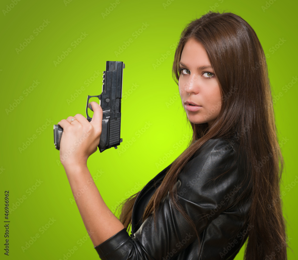 Portrait Of A Woman Holding Gun