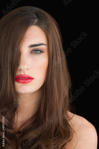Woman with red lips looking at camera